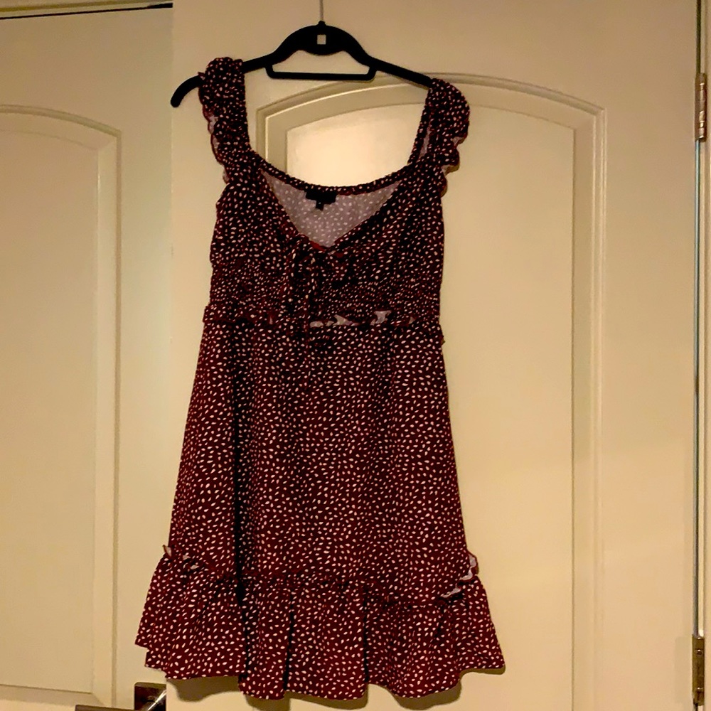South moon under brown polka dot dress